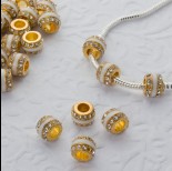 Zdjęcie - Koralik w złotym kolorze emaliowany z kryształkami crystal 5mm